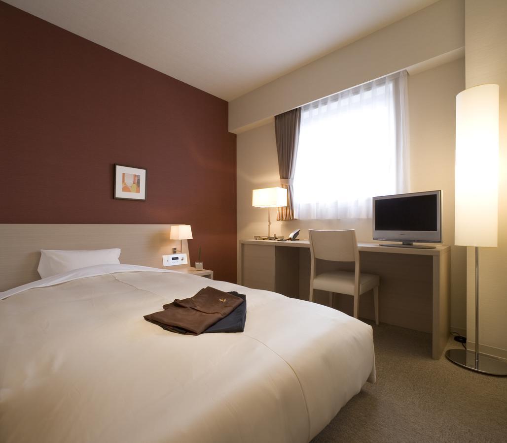 Montein Hotel Кітакамі Номер фото